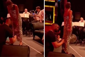 Yine yaptı yapacağını! Yıldız Tilbe onlarca hayranının karşısında elbisesini kestirtti